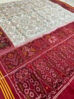Semi ikkat white navaratna Patola saree